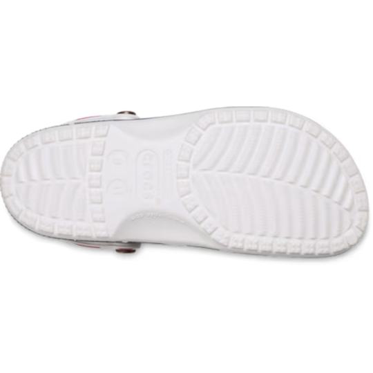 White sandal with textured sole on a white background