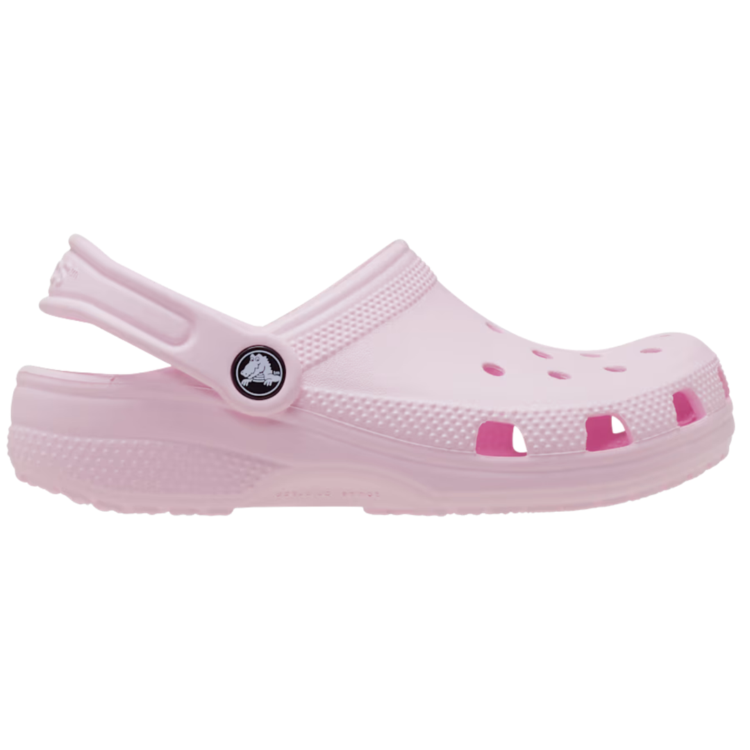 Pink clog shoe on a white background