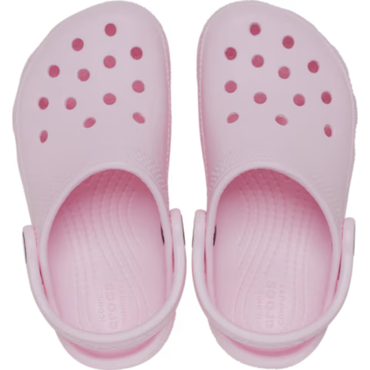 Pink clog shoes on a white background