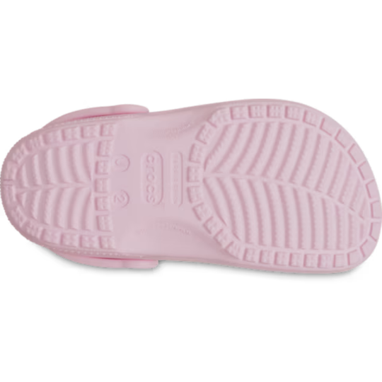 Pink sandal sole with textured pattern on a white background