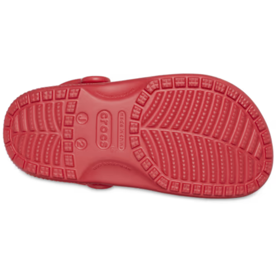 Red sandal sole with brand logo on a white background