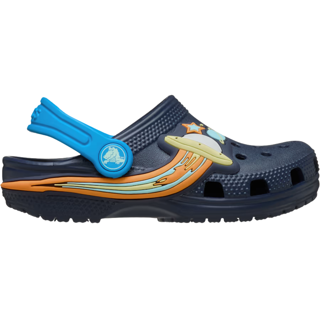 Blue Croc with UFO, planets, and stars on a white background