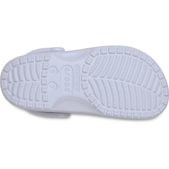 bottom sole of frosted purple clog shoe on a white background