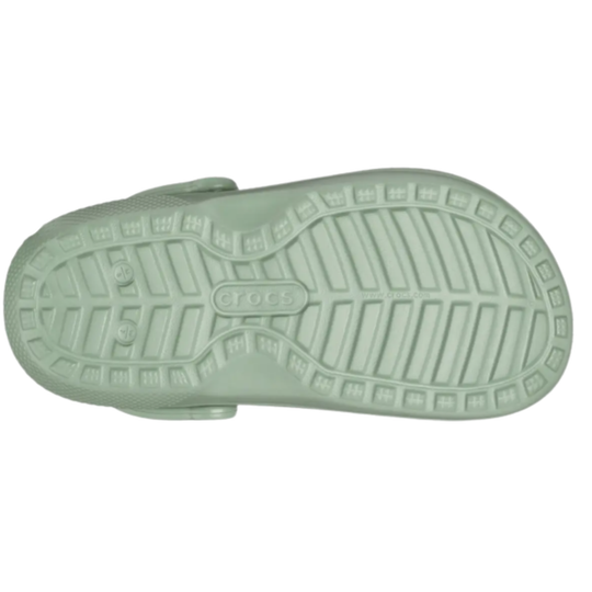 Green sandal sole with brand logo on a white background