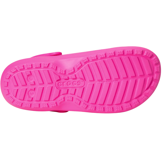 Pink sandal sole with Crocs logo on a white background