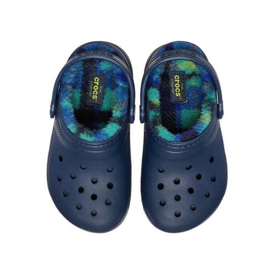 Navy blue clogs with multicolored fur lining on a white background