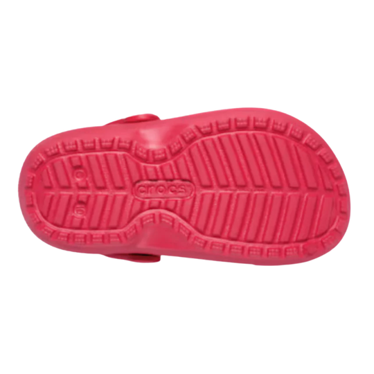 Pink sandal sole with brand logo on a white background