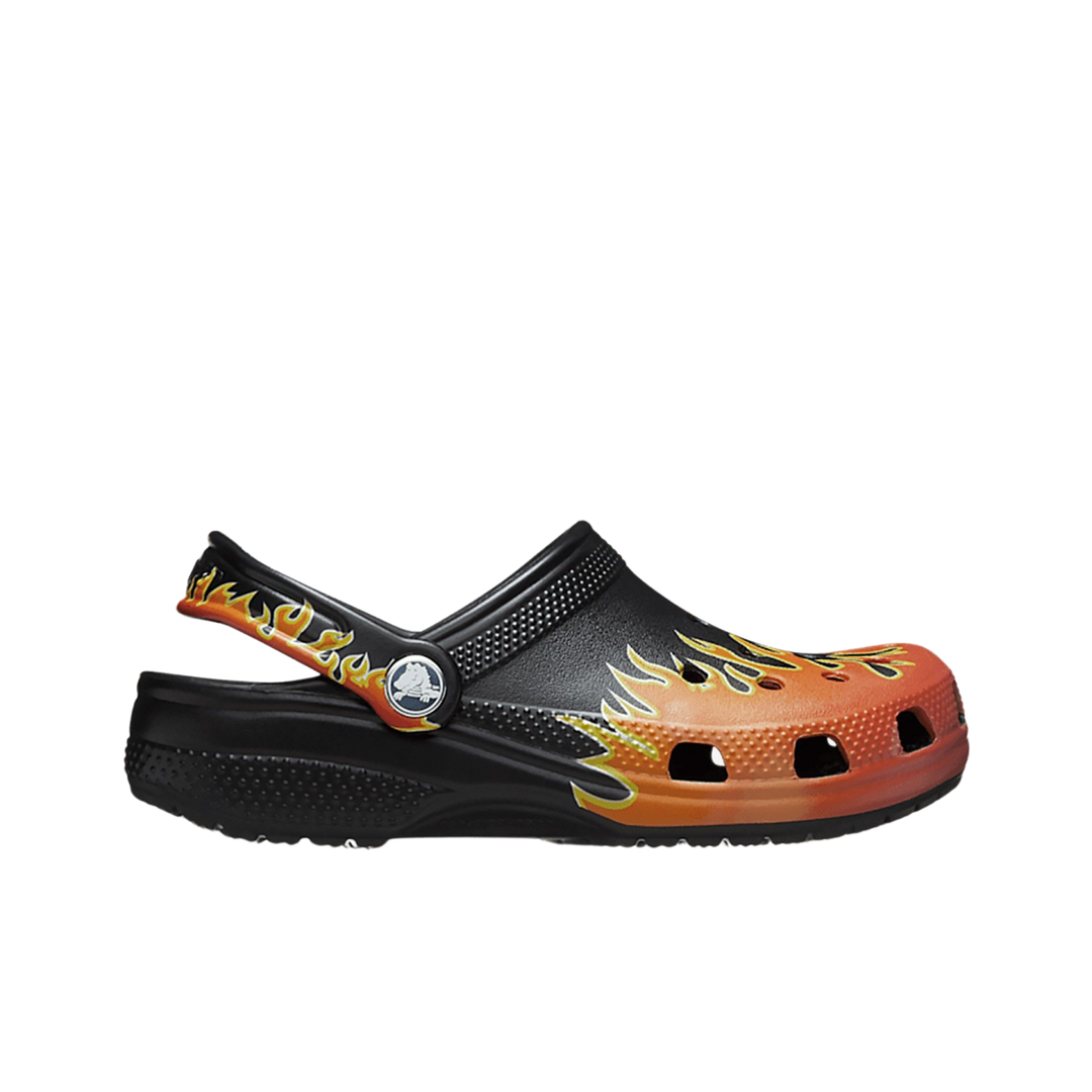 Black and orange clog shoe with flame design on a white background