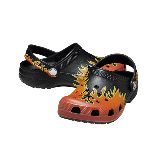 Black and orange flame-patterned clogs on a white background