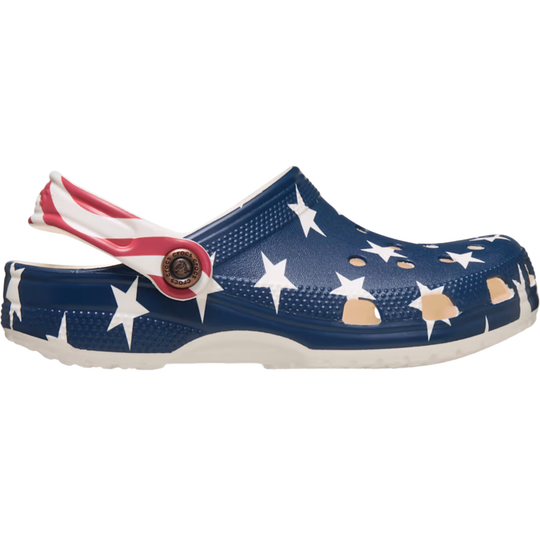 Navy blue clog with white star pattern on a white background