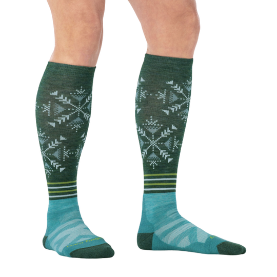 Green and blue patterned knee-high socks on a white background