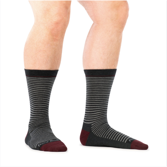 Gray and red striped sock on a white background