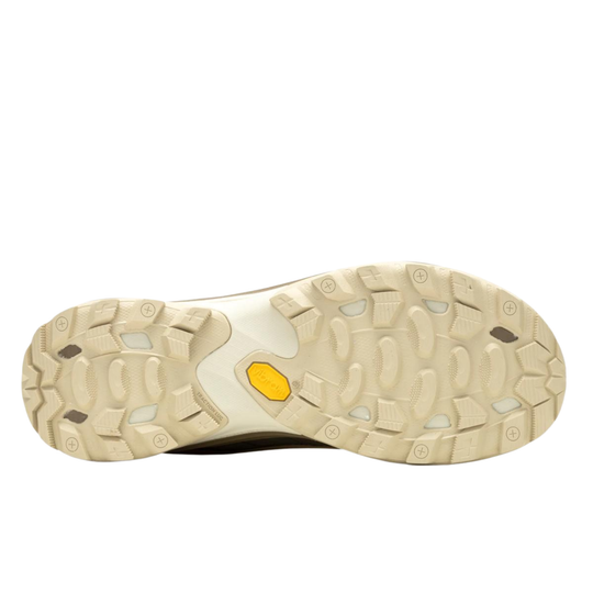 Close-up of a shoe sole with a yellow heel tab on a white background