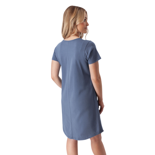 Woman wearing a blue dress on a white background