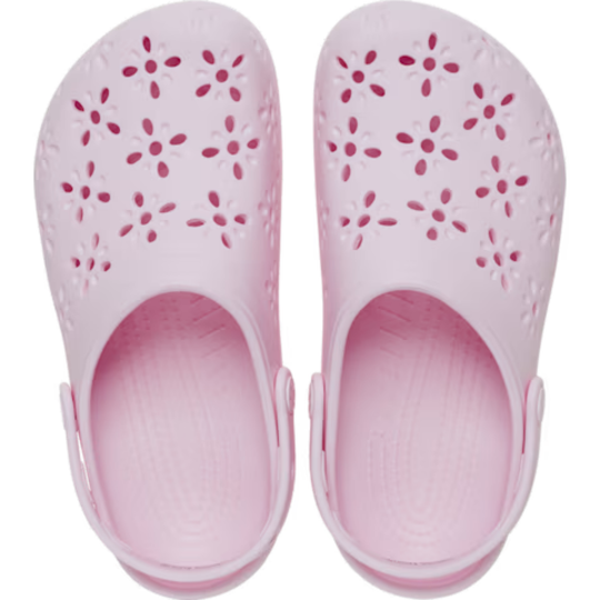 Pair of pink clogs with floral patterns on a white background