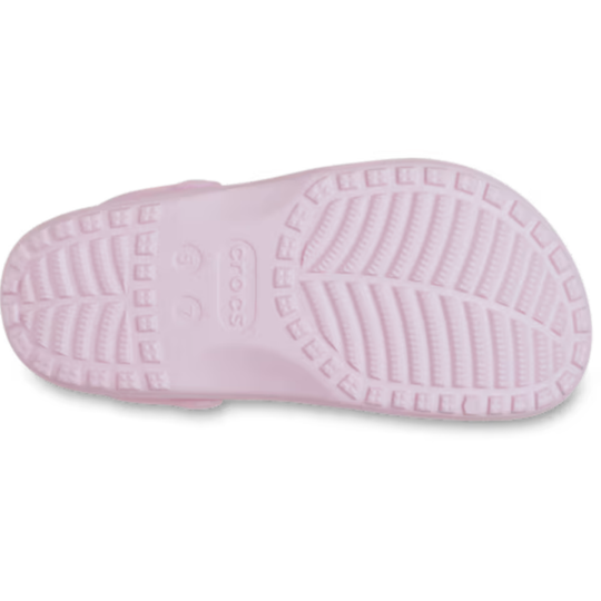 Pink children's clog shoe sole on a white background