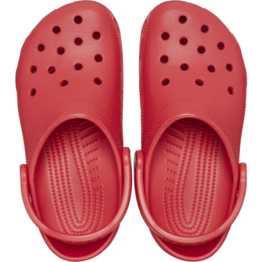 Pair of red clogs on a white background