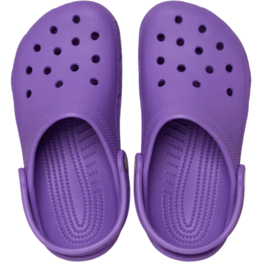 Purple clogs with a white background
