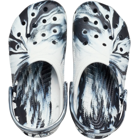 Pair of black and white marbled clogs on a white background