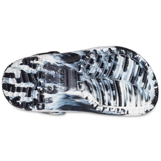 Close-up of a sandal sole with a checkered pattern on a white background