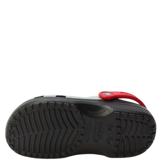 Black sandal with a red strap on a white background
