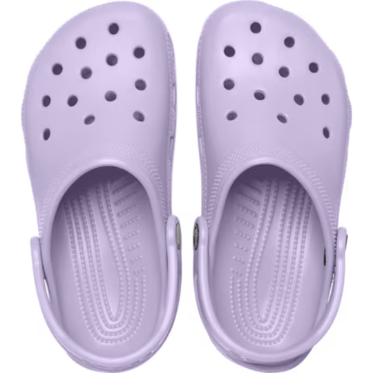 Pair of lavender clogs on a white background