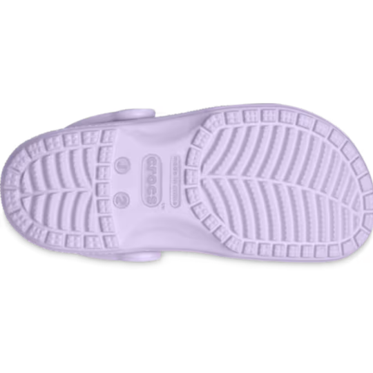 Purple sandal sole with textured pattern on a white background