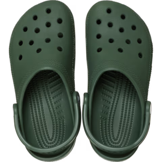 Pair of green clogs on a white background