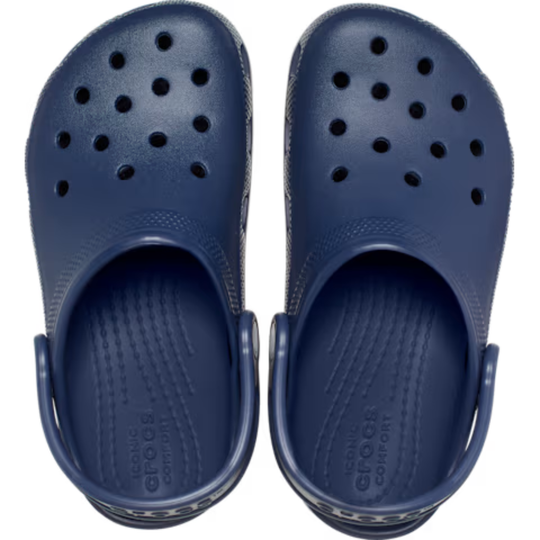 Pair of navy blue Crocs clogs on a white background