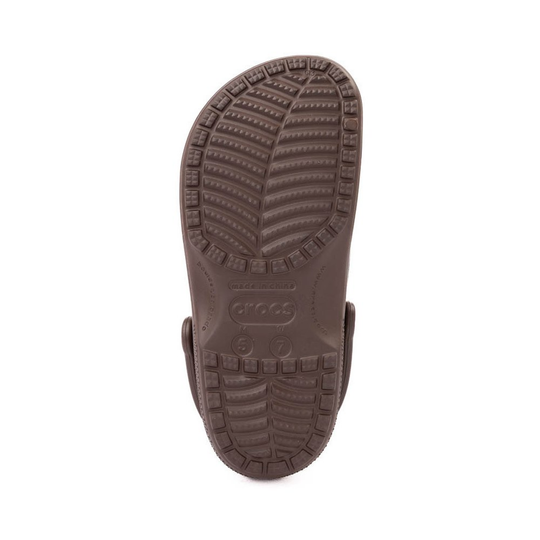 Brown sandal sole with Crocs branding on a white background