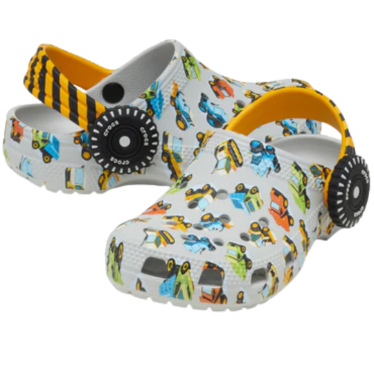 Children's clogs with construction vehicle pattern on a white background