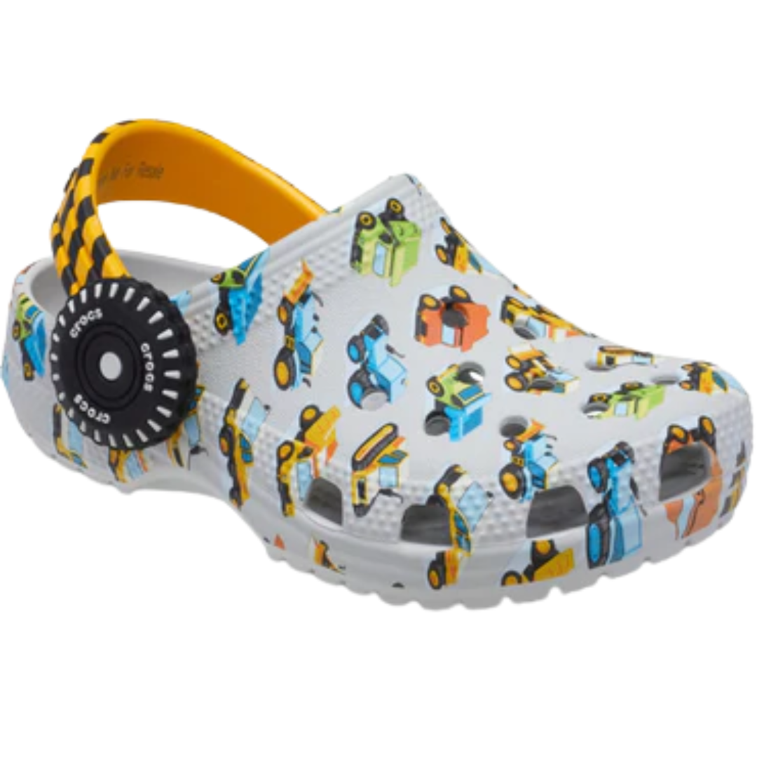 Children's clog shoe with toy truck design on a white background