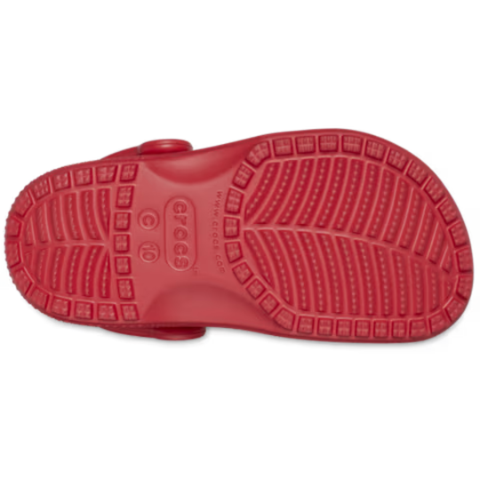 Red sandal sole with brand logo on a white background