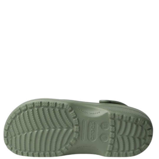 Green sandal sole with Crocs branding on a white background