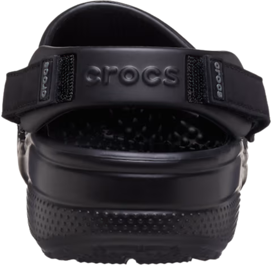 Black clog sandal with 'Crocs' branding on a white background