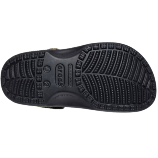 Black shoe sole with brand logo on a white background