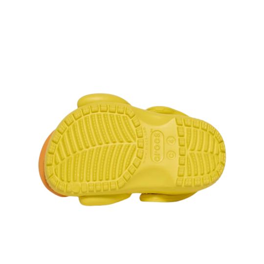 Yellow children's clog on a white background
