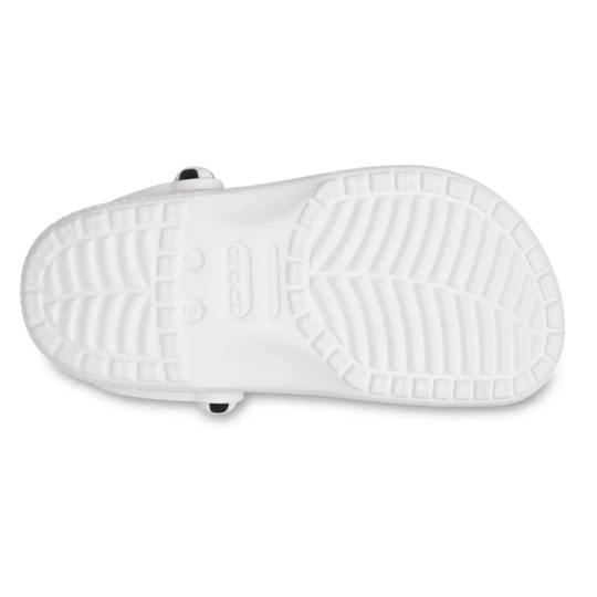 White sandal with textured sole on a white background