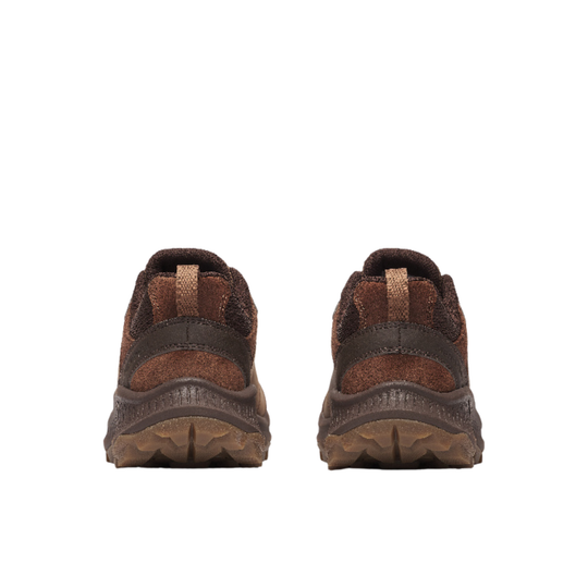 Pair of brown hiking shoes on a white background