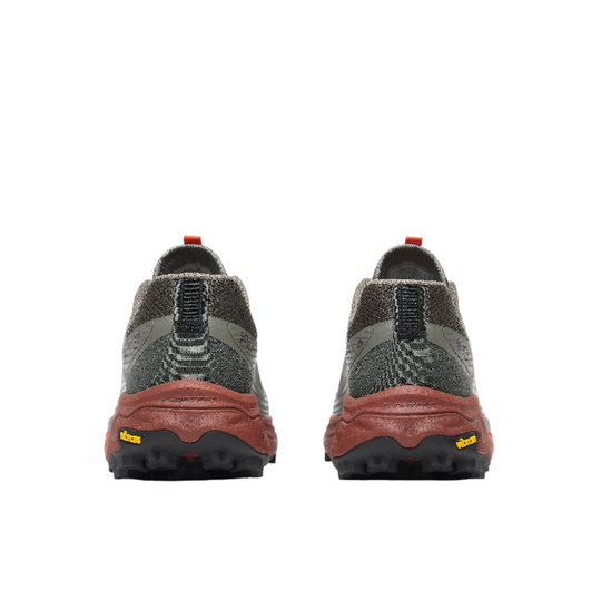 Back view of a pair of hiking shoes on a white background