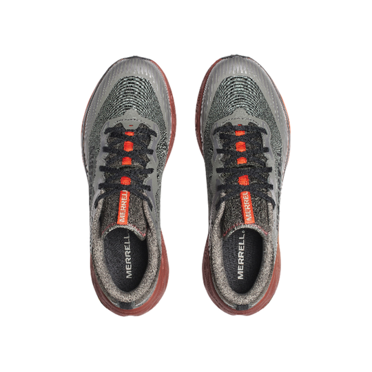 Pair of gray athletic shoes with red accents on a white background