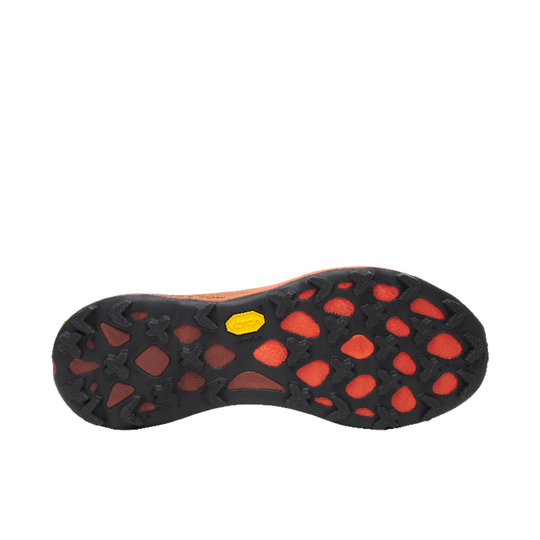 Close-up of a shoe sole with red and black pattern on a white background