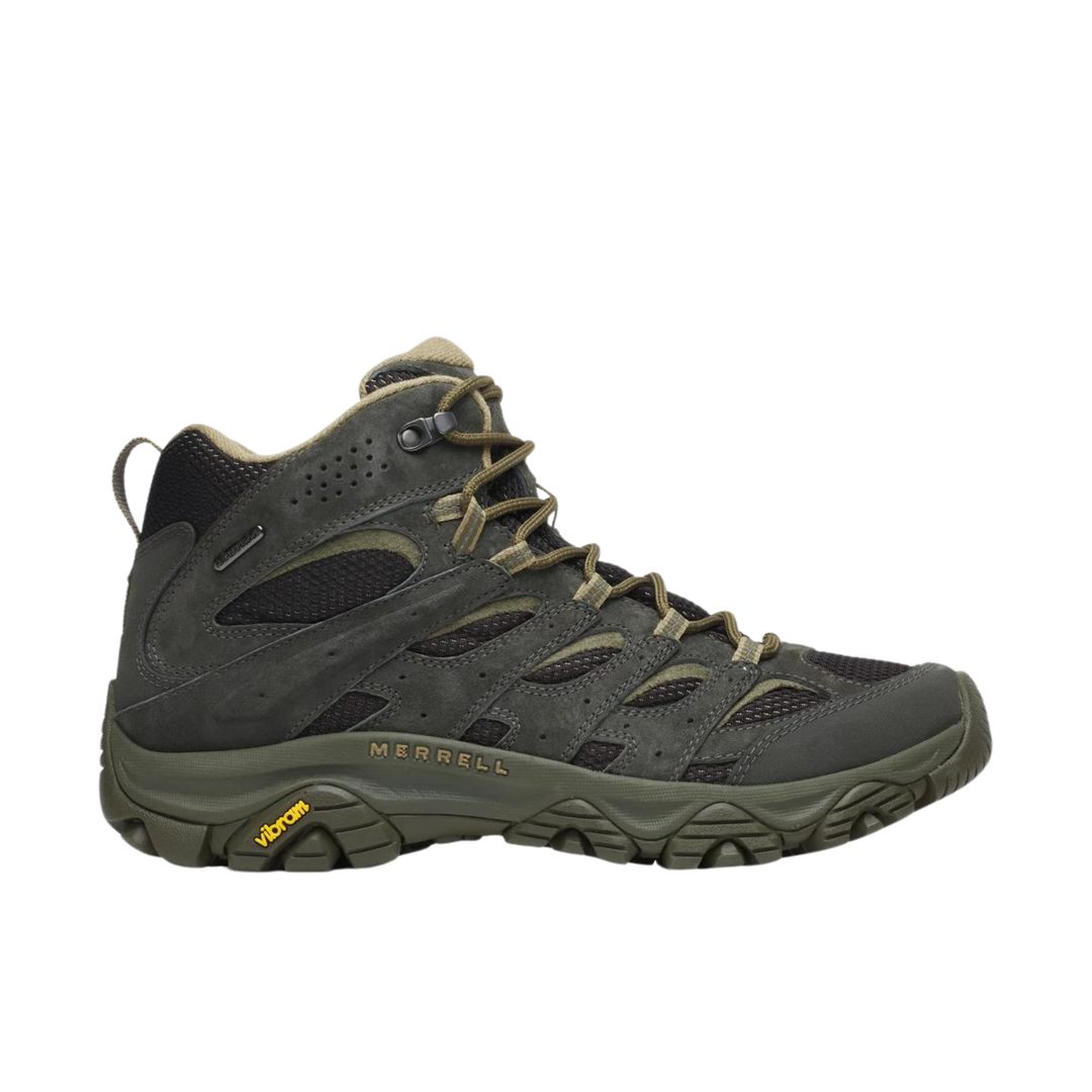 Green hiking boot with brand logo on a white background