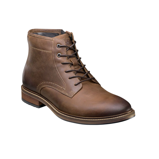 Brown leather boot with laces on a white background