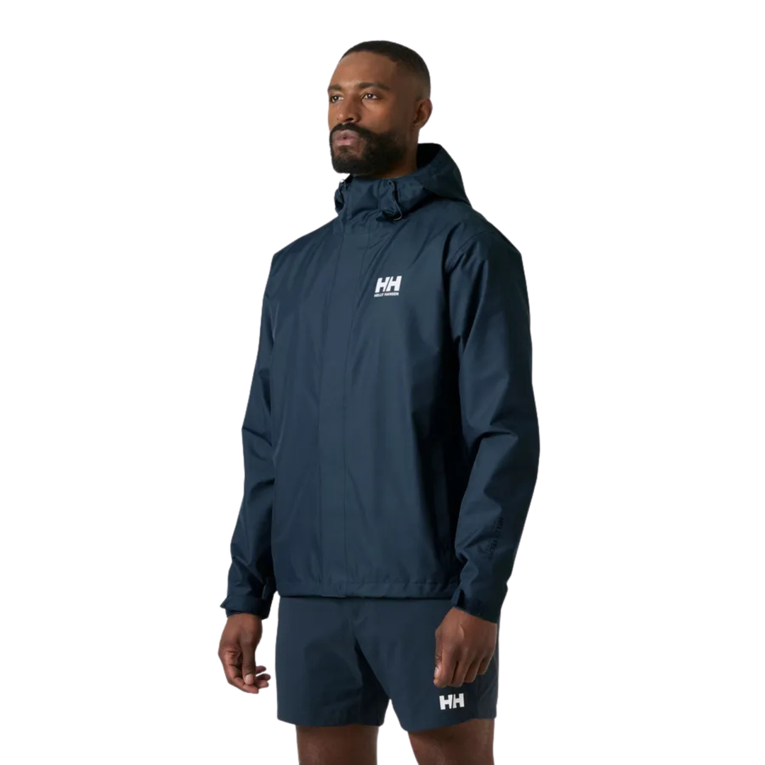Man wearing a navy rain jacket with a brand logo on a light gray background