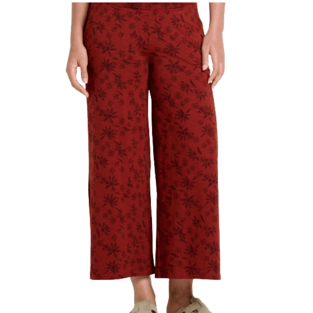 Red floral-patterned pants on a white background