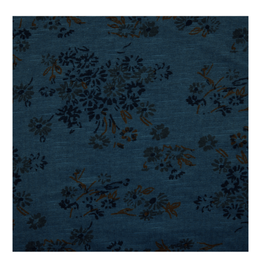 Floral pattern on a blue fabric background