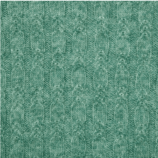 Close-up of teal fabric with a textured pattern