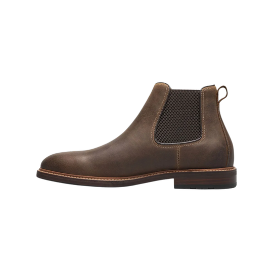 Brown leather Chelsea boot on a white background