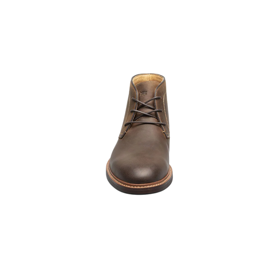 Brown leather boot on a white background